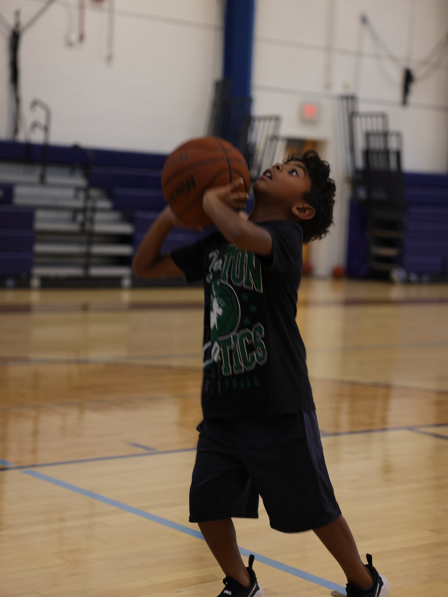 Boston Elite coaches leading a youth basketball camp session